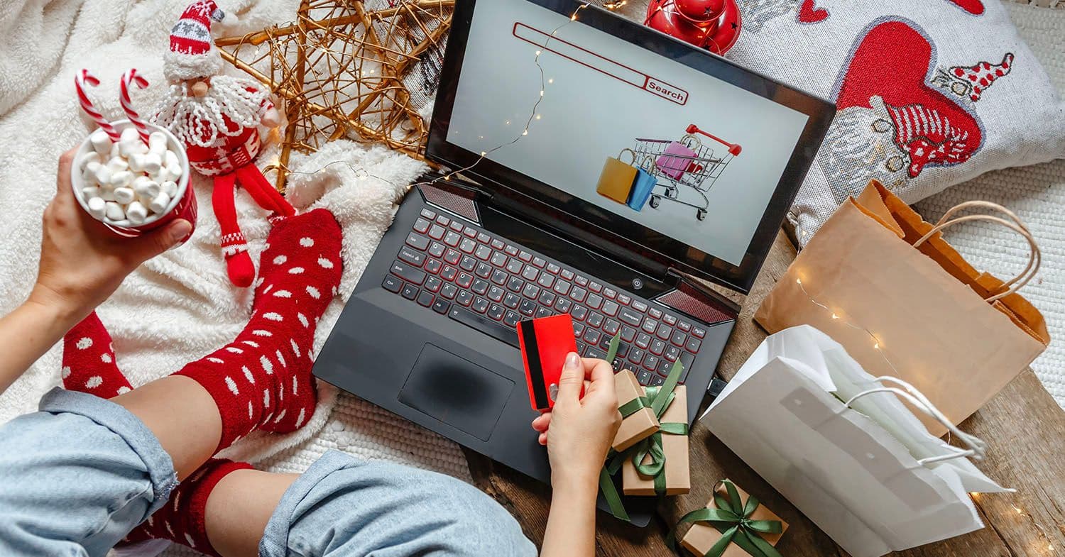 Holiday shopping online with Christmas decorations