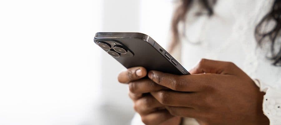 Woman scrolling on an iphone