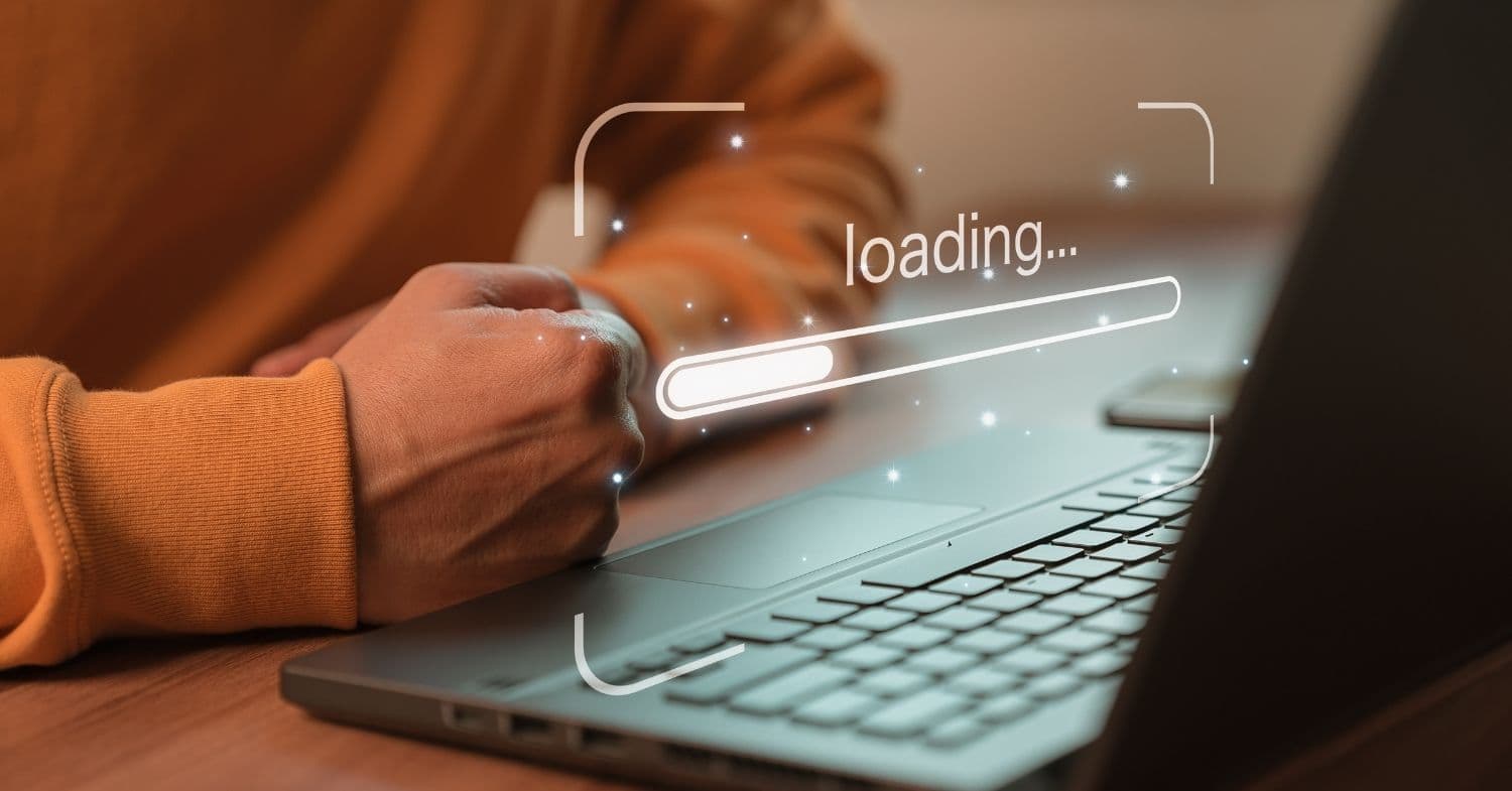 Frustrated person waiting for computer to load