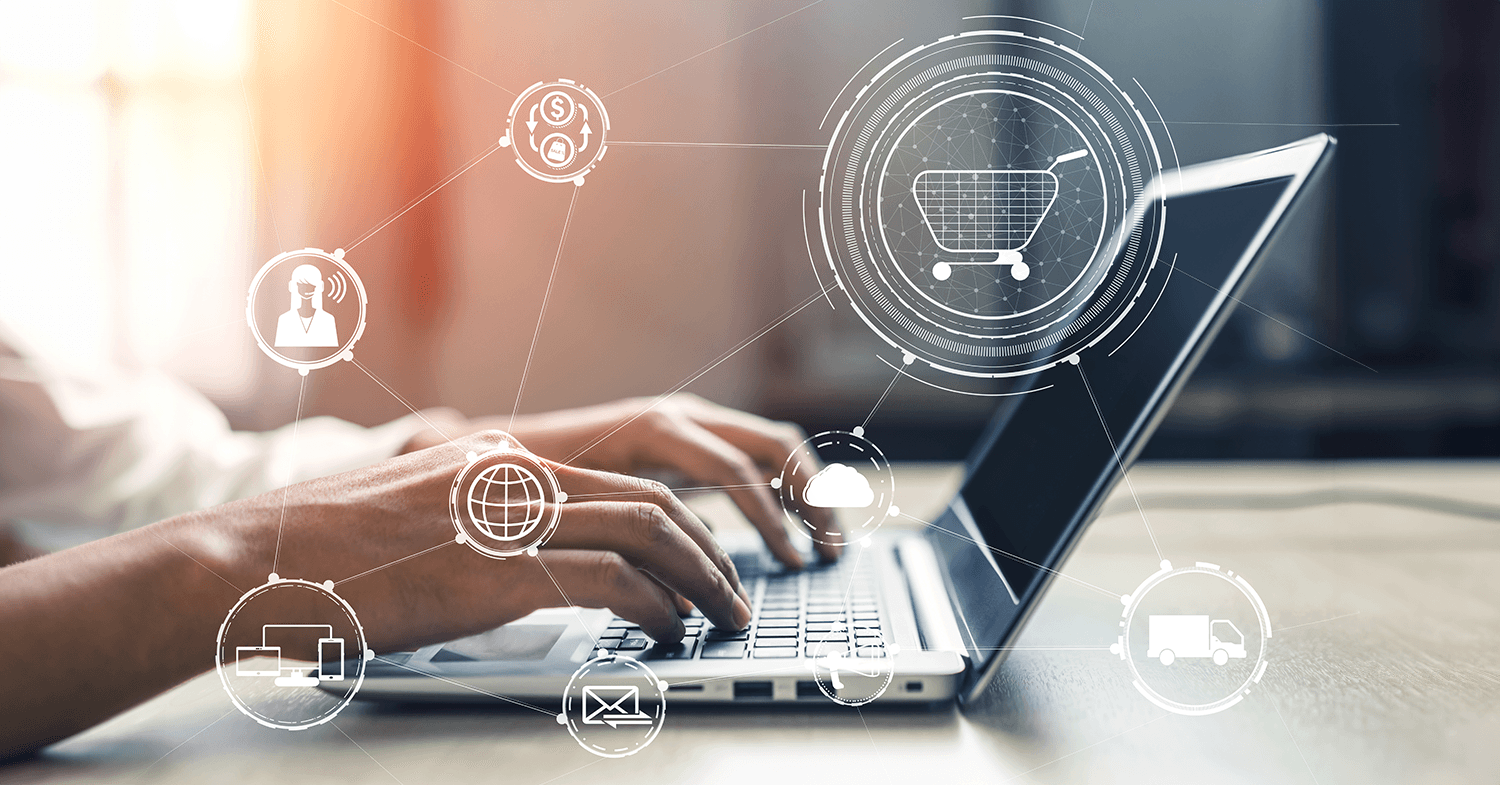 Typing a digital marketing strategy on laptop