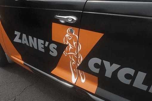 Installation of car wrap advertisement